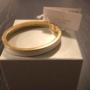 Kate Spade white and gold bangle